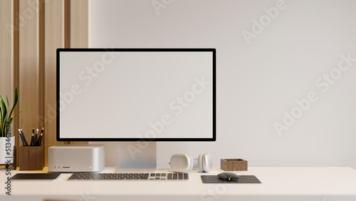 Minimal stylish modern workspace with PC computer mockup and office accessories on table.