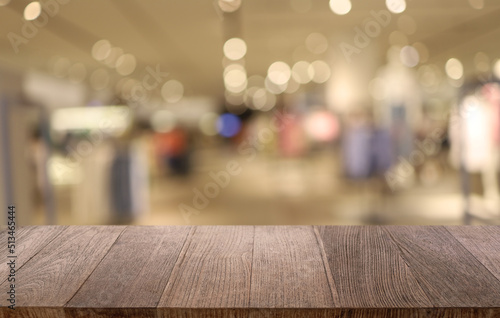 Wallpaper Mural Empty wooden table in front of abstract blurred background of coffee shop . can be used for display or montage your products.Mock up for display of product Torontodigital.ca