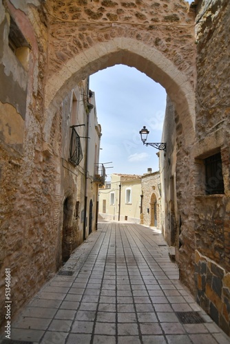 A narrow street among the old houses of Irsina in Basilicata, region in southern Italy. © Giambattista