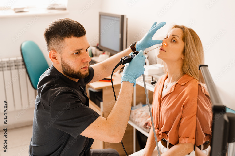 Nose endoscopy. Rhinoscopy procedure with rhinoscope. ENT doctor
