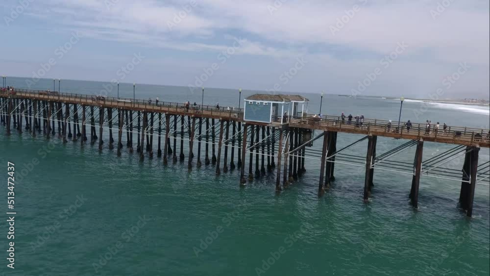 The Pier at Oceanside Beach • People Walking on a Beautiful Summer Day • Horizontal Drone Footage HD • Pacific Beach near San Diego, California