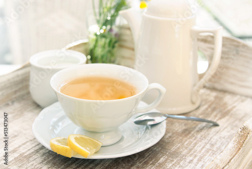 white cup of tea scene