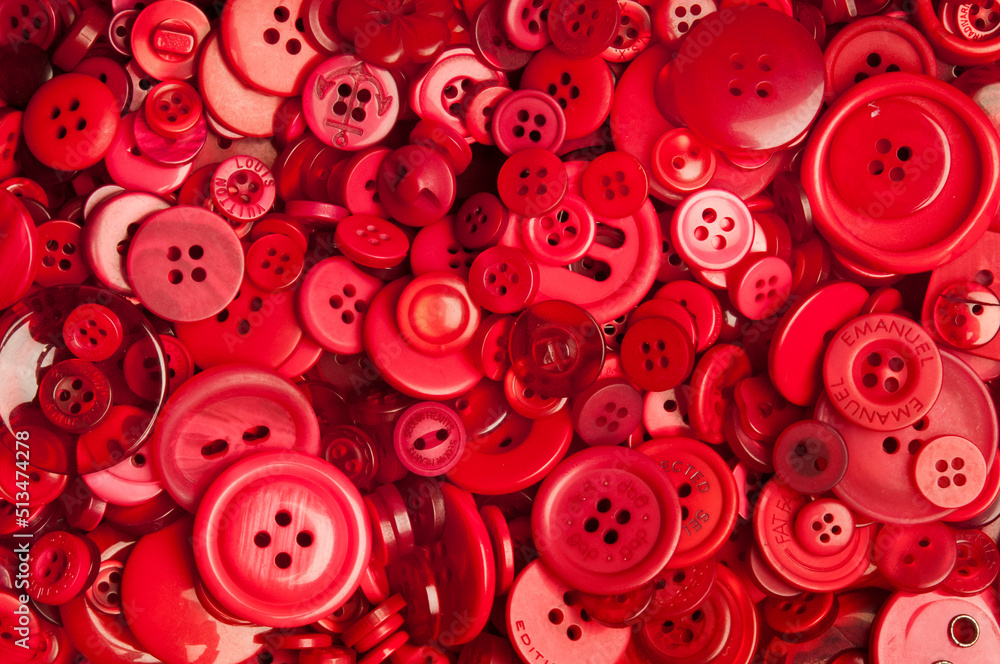 background pattern of red buttons of various size Stock Photo