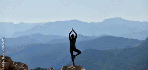 Young Woman Practicing Yoga in Nature