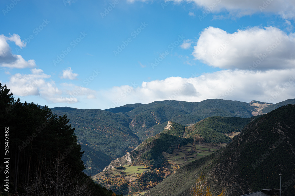 Nice landscape of mountain valley in autumn winter, blue sky with white clouds