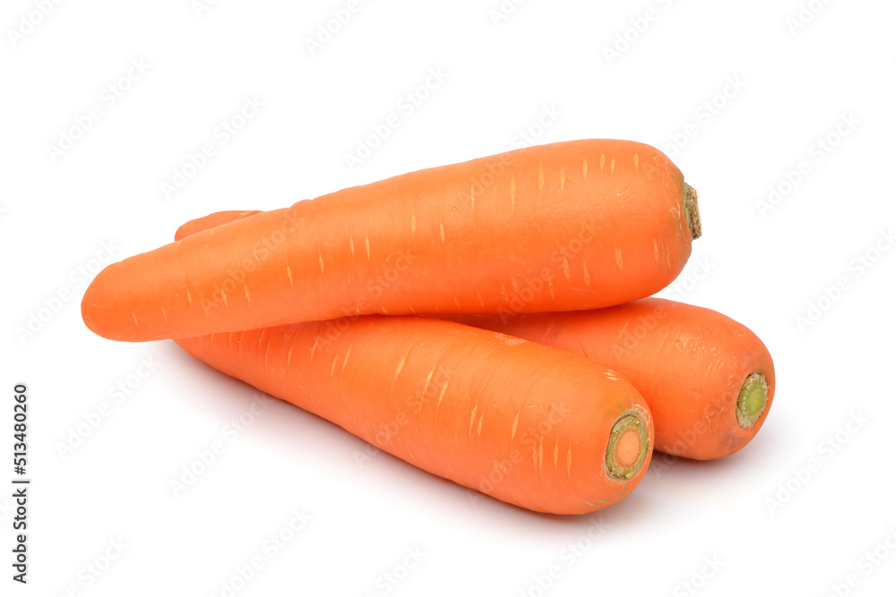 Three Fresh Carrots isolated on white background. Clipping path. Three Fresh Carrots isolated on white background. Clipping path.
