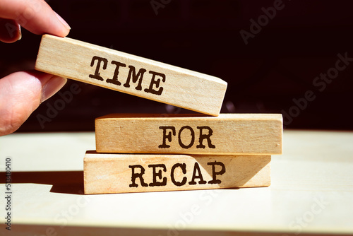 Wooden blocks with words 'TIME FOR RECAP'. photo