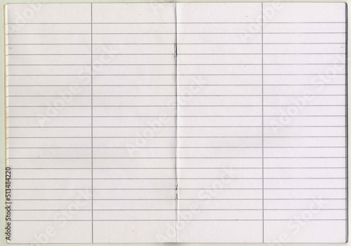 High resolution quality scan of school stapled notebook opening with line paper with vertical line in the middle of each page uncoated paper texture background large wallpaper with copy space for text