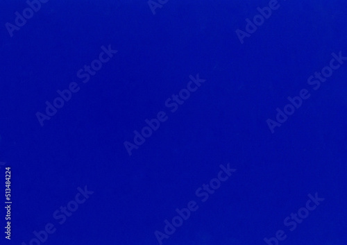 Ultra HD large image of a smooth uncoated dark navy blue paper texture background scan with fine grain fiber pattern for paper materials mockups with copy space for text presentation wallpaper