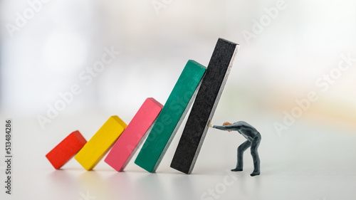 Quadro su tela Company domino effect or chain reaction, financial concept : Businessman CEO pus