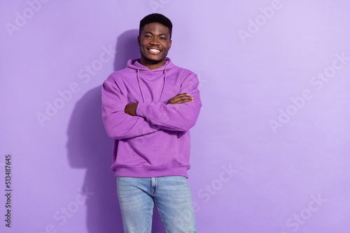 Portrait of attractive cheerful content guy folded arms wearing spring look isolated over bright violet lilac color background