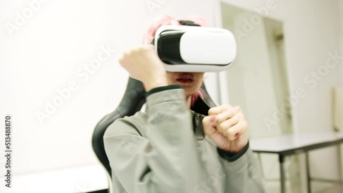 Female used VR Headset at Living Room