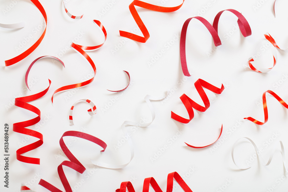 birthday background with red serpentine on white birthday background with red serpentine on white