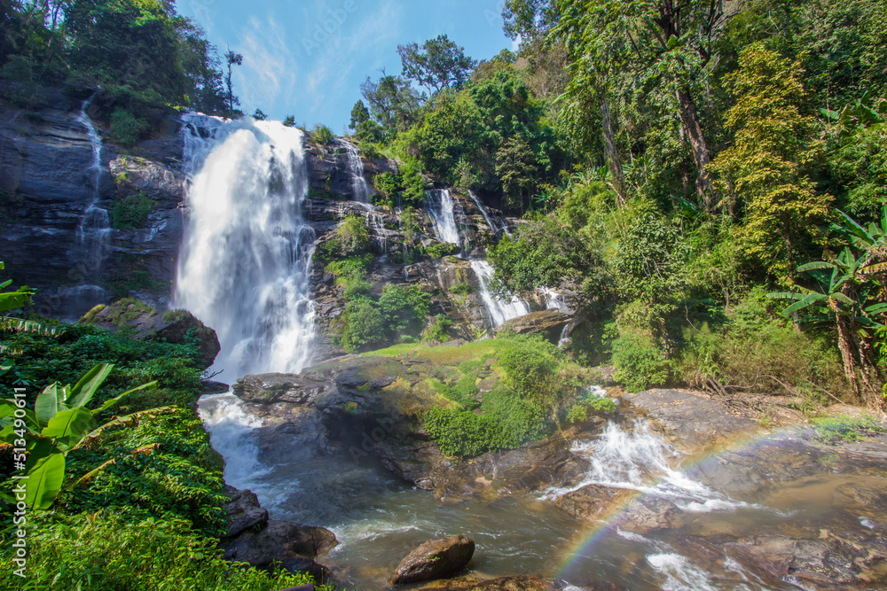 Obraz premium Strong flow with rain-like mist and rainbow in the spray of Vachirathan Waterfall in Doi Inthanon National Park,Chom Thong District,Chiang Mai province,Northern Thailand.
