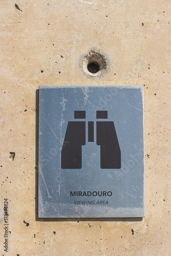 Sign saying miradouro in Portuguese. Information signs. Marking system. Board symbol of binocular. TRANSLATION: miradouro means viewpoint