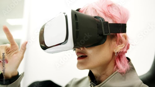 Female used VR Headset at Living Room