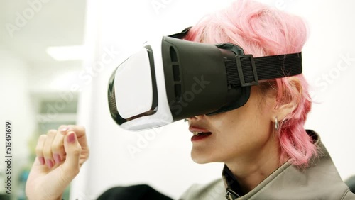 Female used VR Headset at Living Room