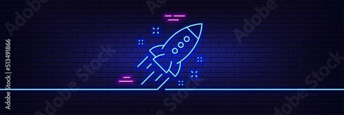 Neon light glow effect. Startup rocket line icon. Launch Project sign. Innovation symbol. 3d line neon glow icon. Brick wall banner. Startup rocket outline. Vector