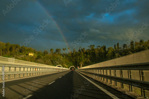 the sky with rainbow after the storm over the expressway