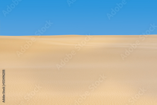 lifeless sandy desert landscape under blue sky