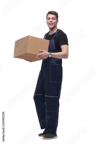 man in overalls with a cardboard box. isolated on white © ASDF