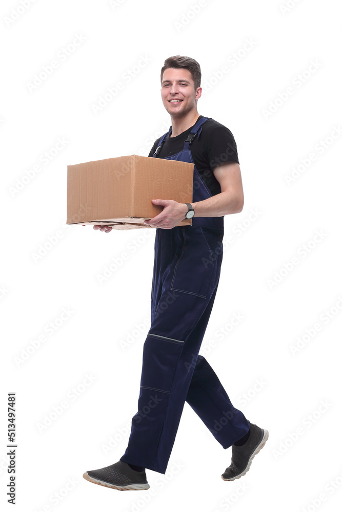 smiling worker with cardboard box stepping forward. isolated on white smiling worker with cardboard box stepping forward. isolated on white