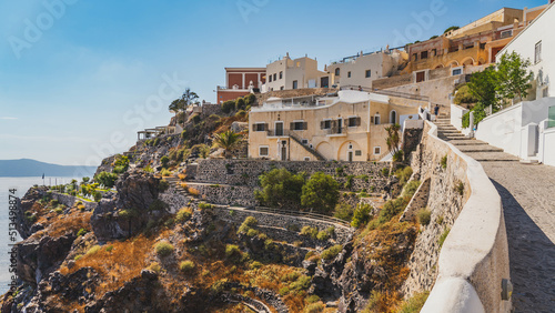 Fototapeta Naklejka Na Ścianę i Meble -  Streets and buildings in the street of Fira (Thera) city on the island of Santorini, Greece.