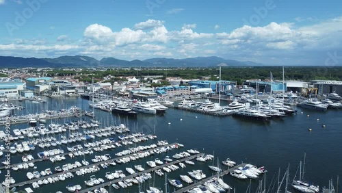 Aerial pull over the busy marina in Viareggio, Italy. 