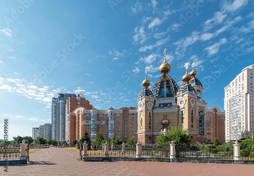 Morning embankment with a church on Obolon in Kyiv