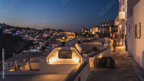Fototapeta Naklejka Na Ścianę i Meble -  Streets and buildings in the street of Fira (Thera) city on the island of Santorini, Greece.