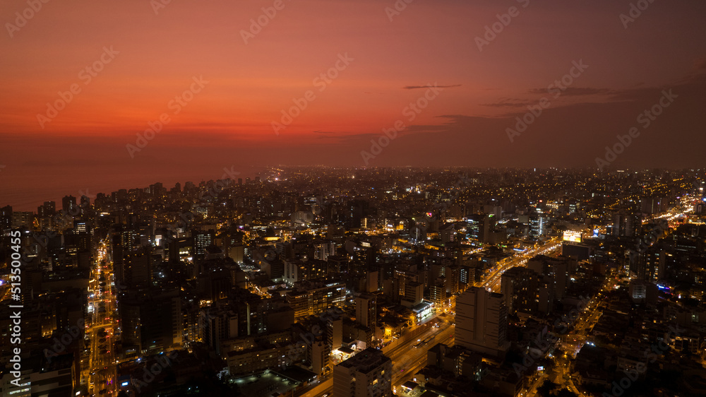 Excellent night aerial view of Av. Alfredo Benavides and Vía Expresa Luis Bedoya Reyes in the city of Lima.