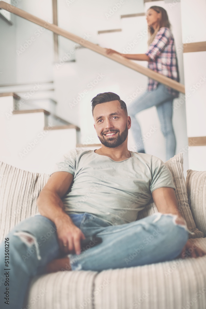 close up. young man sitting on sofa. close up. young man sitting on sofa.
