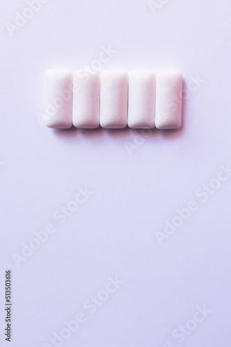 Top view of chewing gums on white background with copy space.