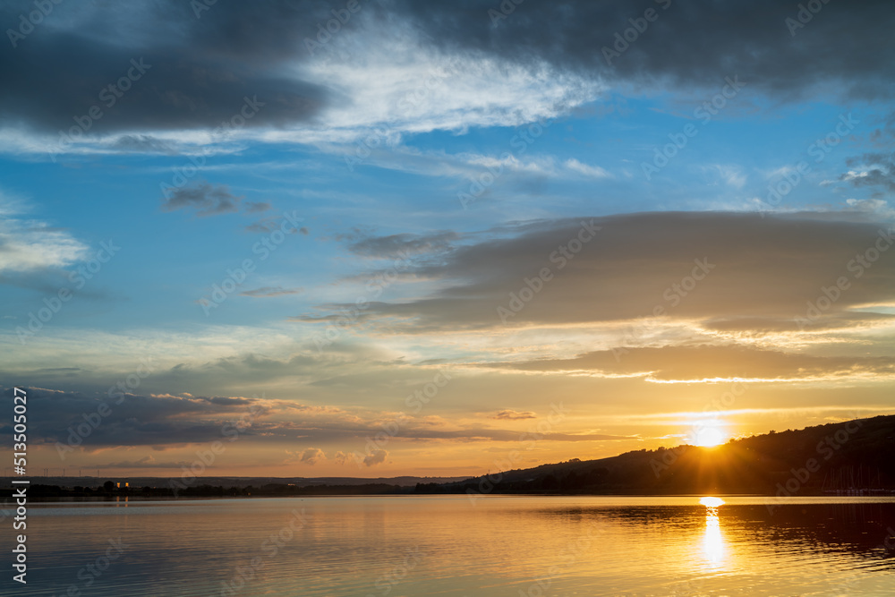 Fototapeta premium sunset over the lake