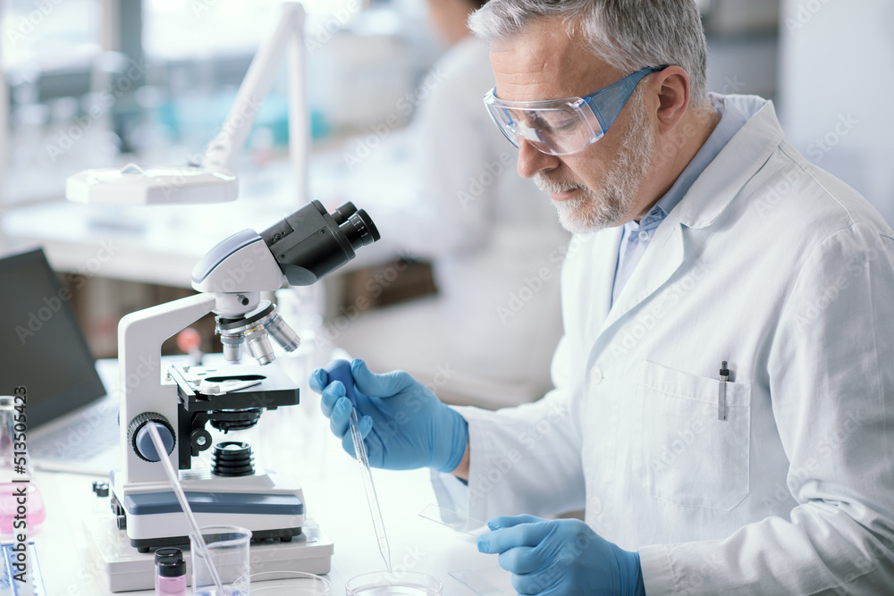 Scientist working in the laboratory Scientist working in the laboratory