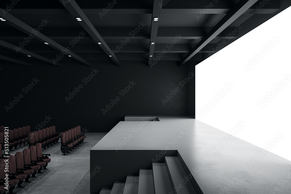 Side view on empty concert hall with blank white screen with space for