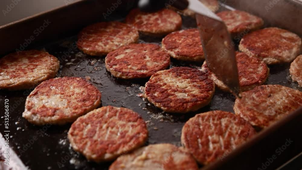 cooking meat cutlets on a grill cooking meat cutlets on a grill