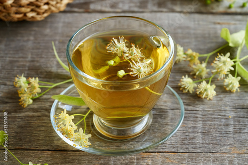 A cup of herbal tea with linden flowers