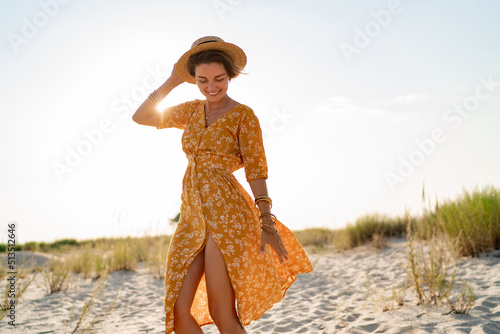 stylish attractive slim smiling woman on beach in summer style fashion trend outfit