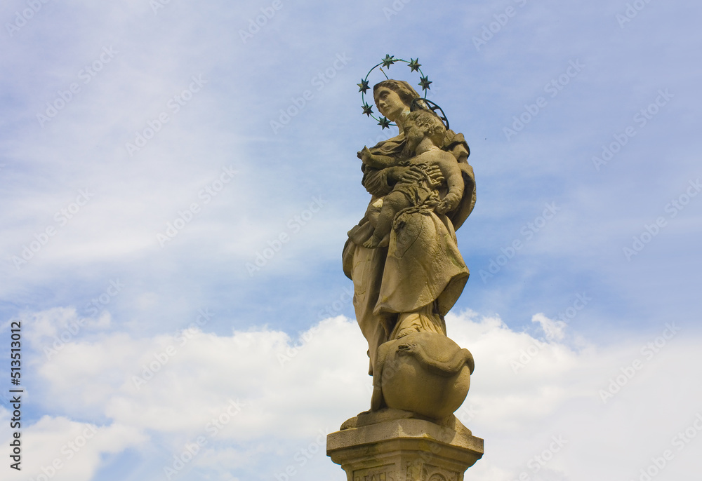 Sculpture of Maria with Child Jesus in front of St. John the Baptist's Cathedral in Wroclaw, Poland