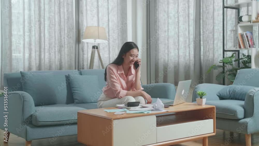Asian Woman With A Laptop Answering The Call Then Being Happy While Looking At The Bill In Hand
Asian Woman With A Laptop Answering The Call Then Being Happy While Looking At The Bill In Hand