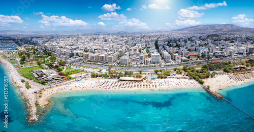 Fototapeta Naklejka Na Ścianę i Meble -  Aerial view of the turquoise sea at Kalamaki Beach, south Athens riviera coast, Greece, during summer time