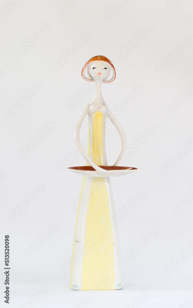 Mid-century porcelain figurine - standing woman with a bowl Mid-century porcelain figurine - standing woman with a bowl