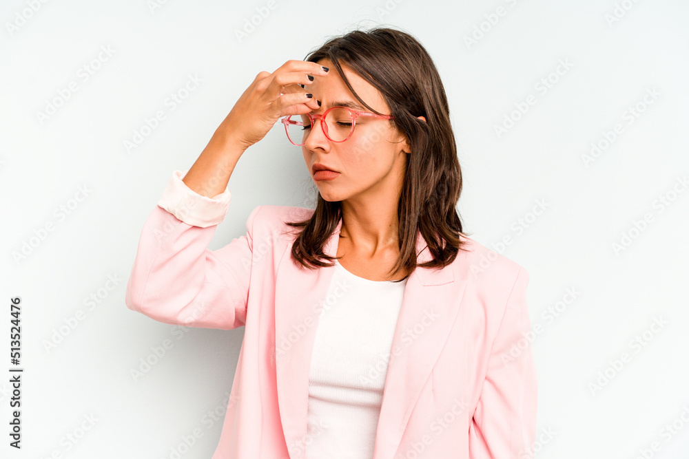 Young hispanic woman isolated on blue background funny and friendly sticking out tongue. Young hispanic woman isolated on blue background funny and friendly sticking out tongue.