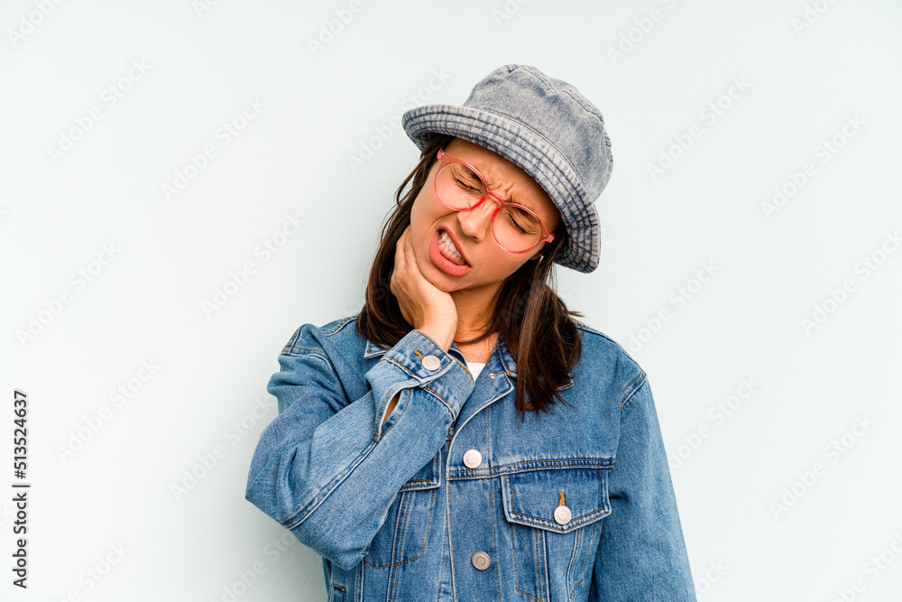 Young hispanic woman isolated on blue background excited pointing with forefingers away. Young hispanic woman isolated on blue background excited pointing with forefingers away.