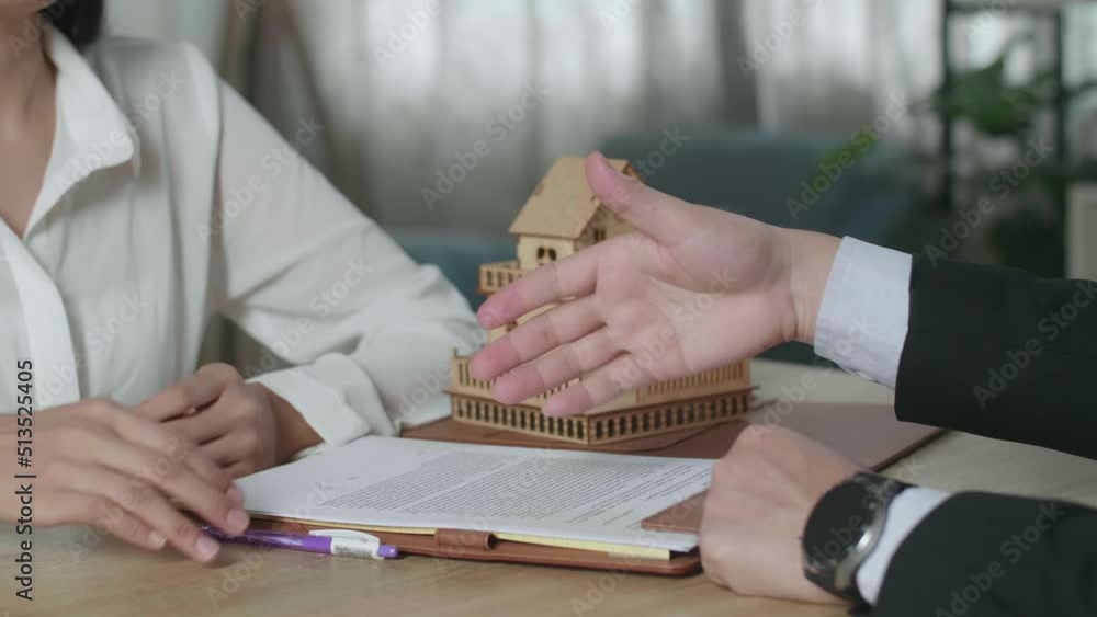 Close Up Of Real Estate Agent With House Purchase Contract Paper Giving ...
