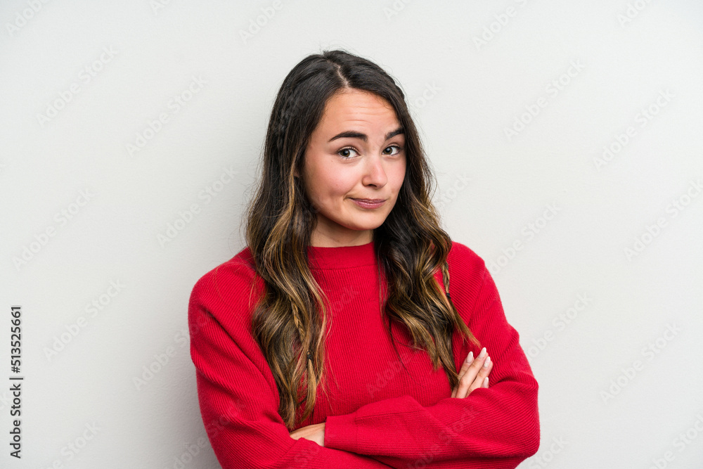 Young caucasian woman isolated on white background suspicious, uncertain, examining you. Young caucasian woman isolated on white background suspicious, uncertain, examining you.