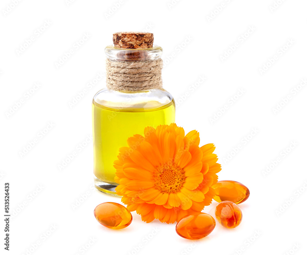 Vitamin capsules with calendula flowers and oil. Vitamin capsules with calendula flowers and oil.