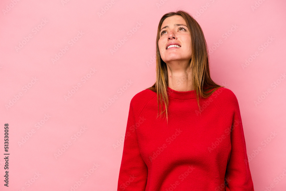 Fototapeta premium Young caucasian pregnant woman isolated on white background shouting very angry, rage concept, frustrated.