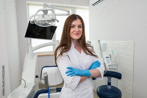 Portrait of a young beautiful female dentist